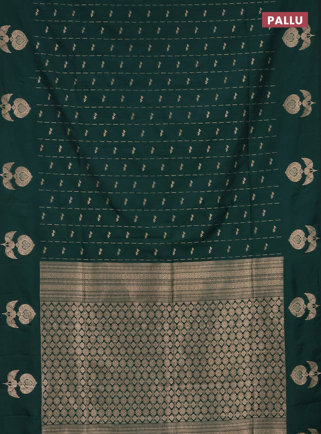 Semi soft silk saree dark green with allover zari weaves and zari woven butta border