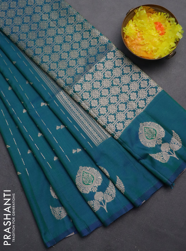 Semi soft silk saree dual shade of bluish green with allover zari weaves and zari woven butta border