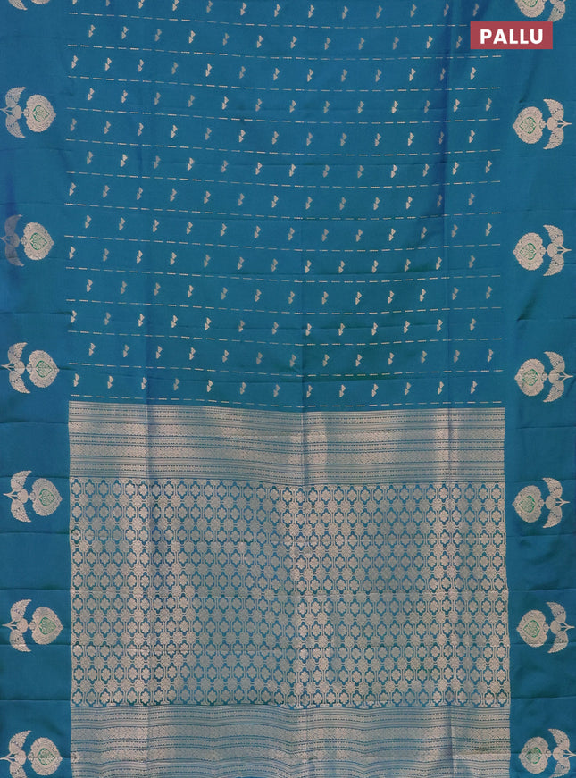 Semi soft silk saree dual shade of bluish green with allover zari weaves and zari woven butta border