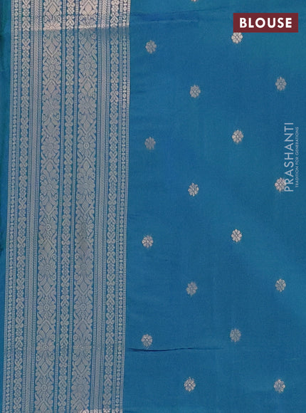 Semi soft silk saree dual shade of bluish green with allover zari weaves and zari woven butta border