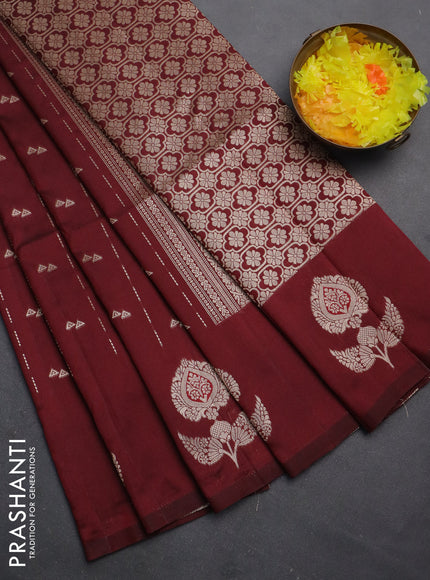 Semi soft silk saree maroon with allover zari weaves and zari woven butta border