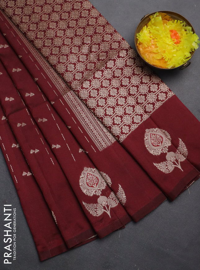 Semi soft silk saree maroon with allover zari weaves and zari woven butta border