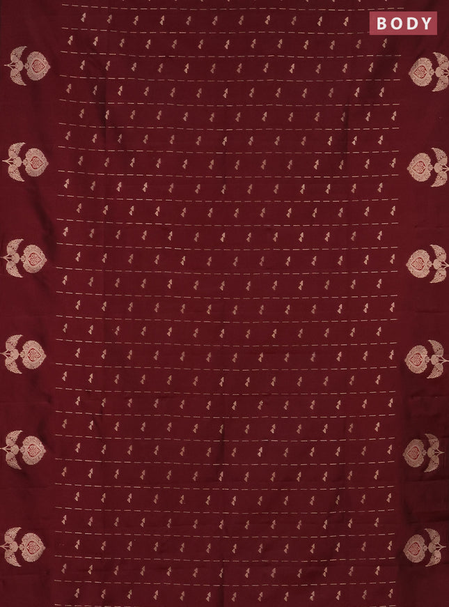 Semi soft silk saree maroon with allover zari weaves and zari woven butta border