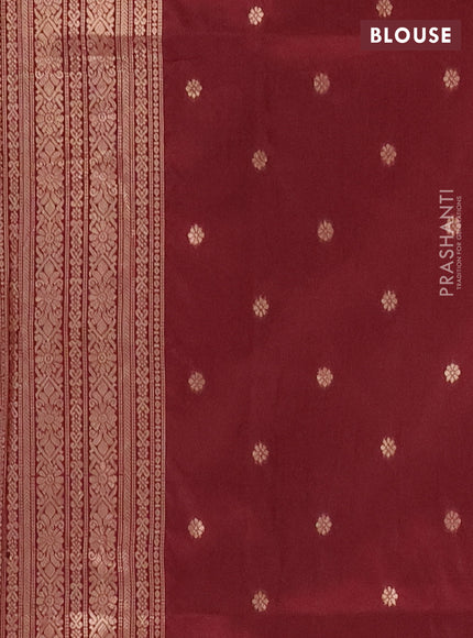 Semi soft silk saree maroon with allover zari weaves and zari woven butta border