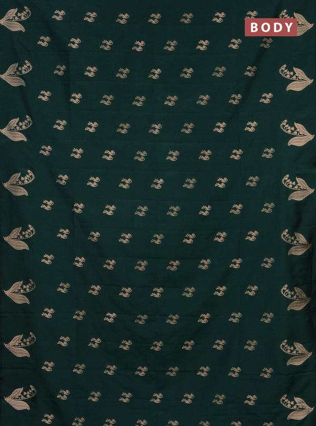 Semi soft silk saree dark green with zari woven buttas and zari woven butta border