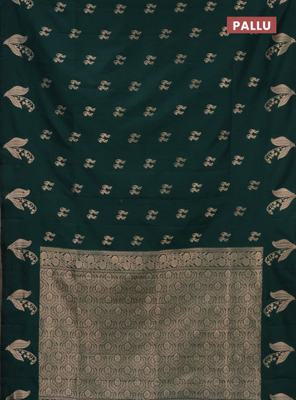 Semi soft silk saree dark green with zari woven buttas and zari woven butta border