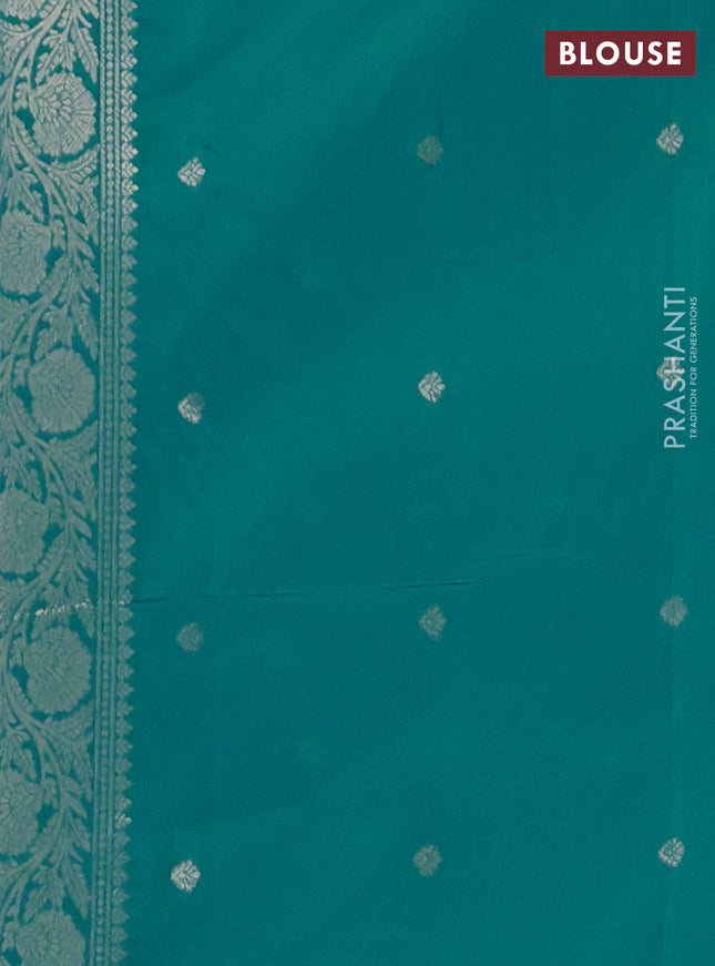 Semi soft silk saree teal blue with zari woven buttas and zari woven butta border