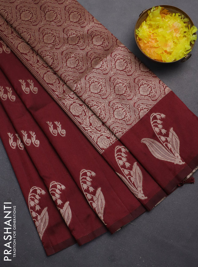 Semi soft silk saree maroon with zari woven buttas and zari woven butta border