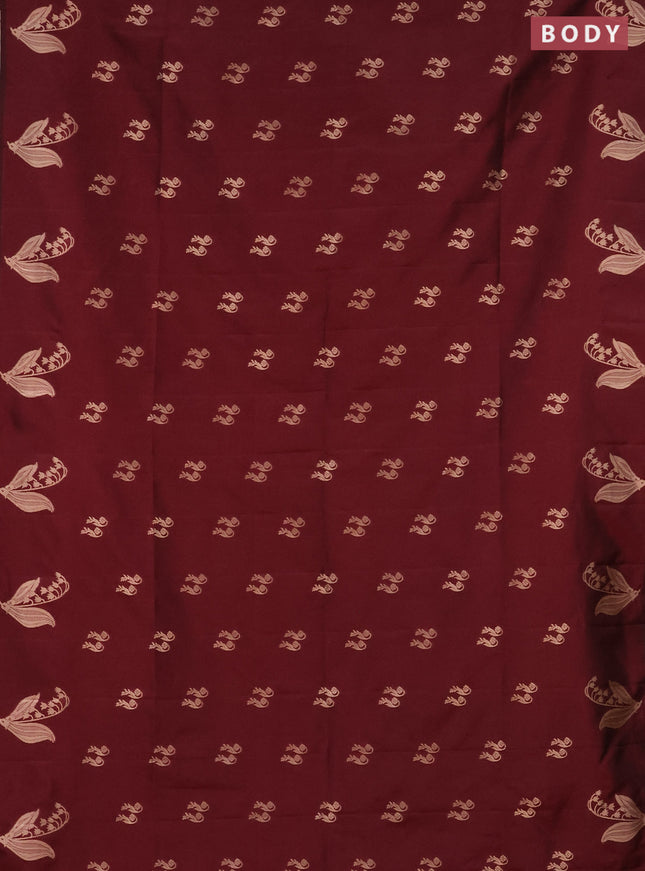Semi soft silk saree maroon with zari woven buttas and zari woven butta border