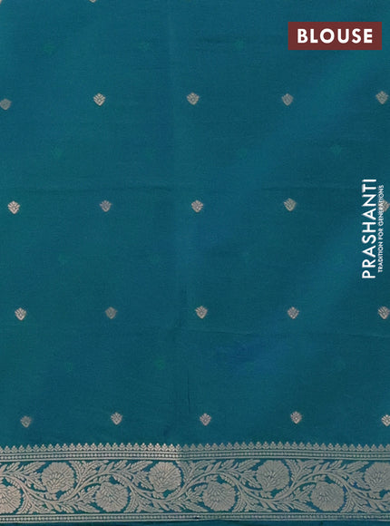 Semi soft silk saree dual shade of bluish green with zari woven buttas and zari woven butta border