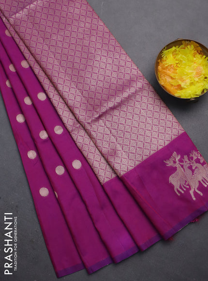 Semi soft silk saree dual shade of purple with zari woven coin buttas and zari woven deer butta border
