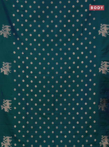 Semi soft silk saree dual shade of greenish blue with zari woven coin buttas and zari woven deer butta border