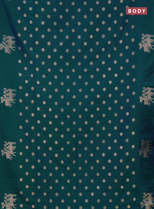 Semi soft silk saree dual shade of greenish blue with zari woven coin buttas and zari woven deer butta border