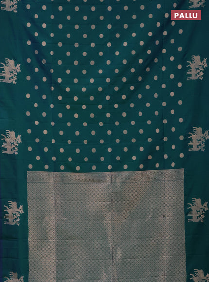Semi soft silk saree dual shade of greenish blue with zari woven coin buttas and zari woven deer butta border