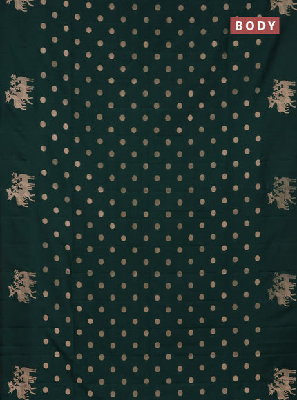 Semi soft silk saree dark green with zari woven coin buttas and zari woven deer butta border