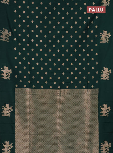 Semi soft silk saree dark green with zari woven coin buttas and zari woven deer butta border