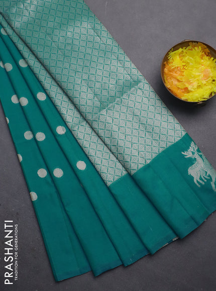 Semi soft silk saree teal blue with zari woven coin buttas and zari woven deer butta border