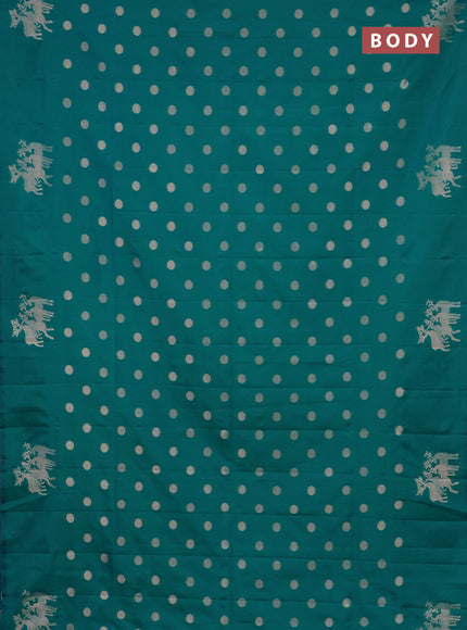 Semi soft silk saree teal blue with zari woven coin buttas and zari woven deer butta border