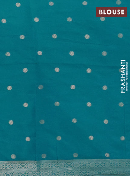 Semi soft silk saree teal blue with zari woven coin buttas and zari woven deer butta border