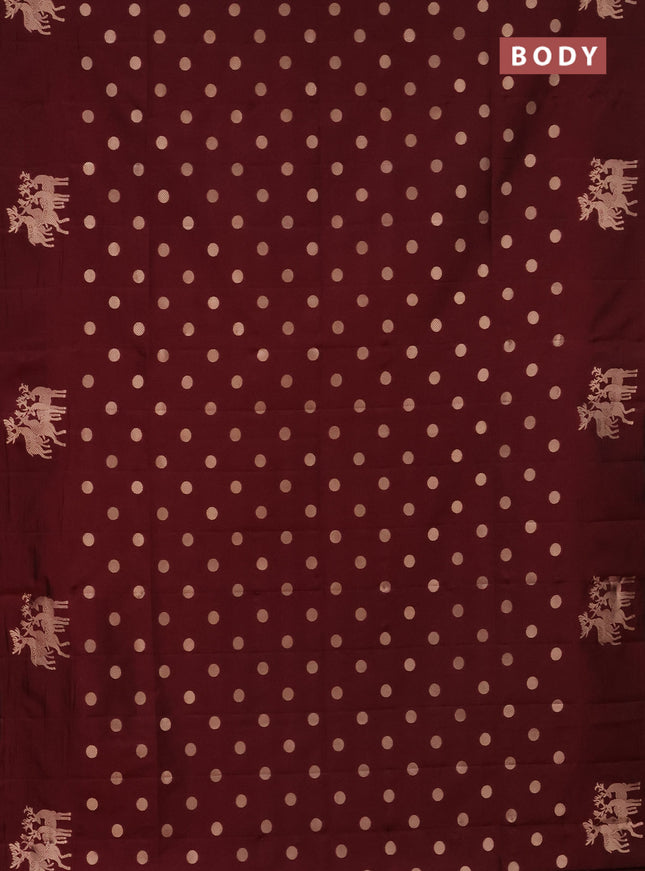 Semi soft silk saree maroon with zari woven coin buttas and zari woven deer butta border