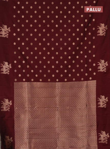 Semi soft silk saree maroon with zari woven coin buttas and zari woven deer butta border
