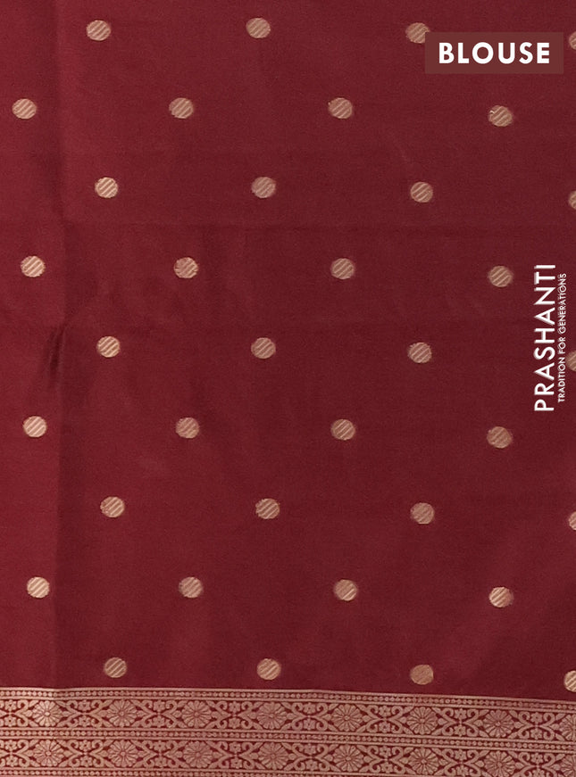 Semi soft silk saree maroon with zari woven coin buttas and zari woven deer butta border