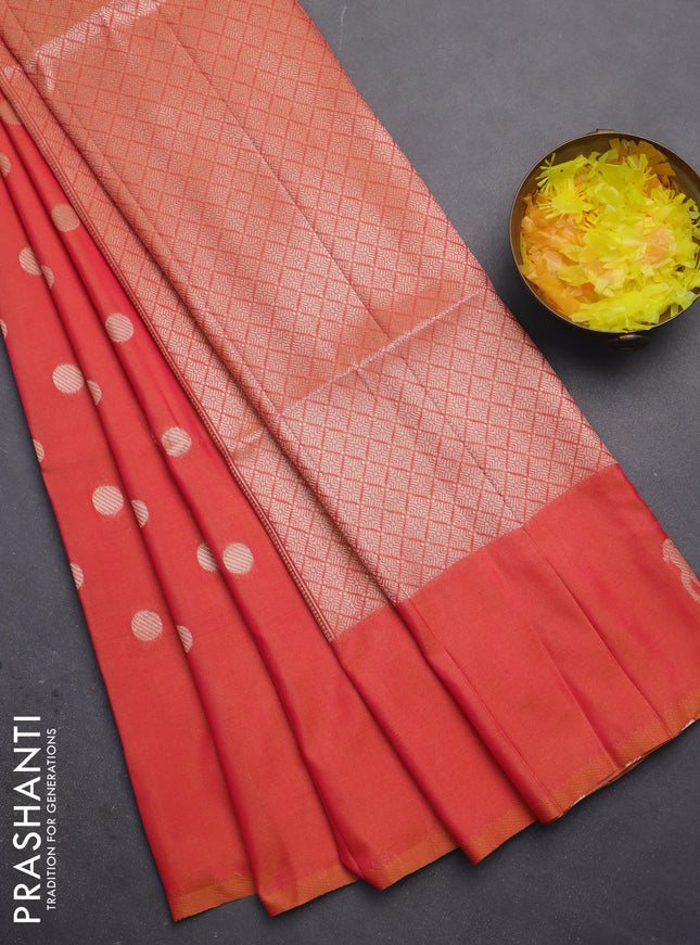 Semi soft silk saree dual shade of pinkisha orange with zari woven coin buttas and zari woven deer butta border