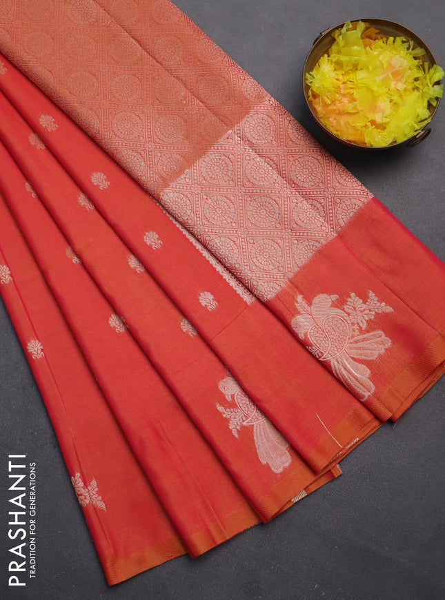 Semi soft silk saree dual shade of pinkisha orange with allover zari woven buttas with zari woven bird butta border
