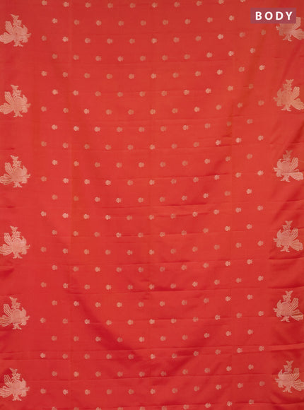 Semi soft silk saree dual shade of pinkisha orange with allover zari woven buttas with zari woven bird butta border