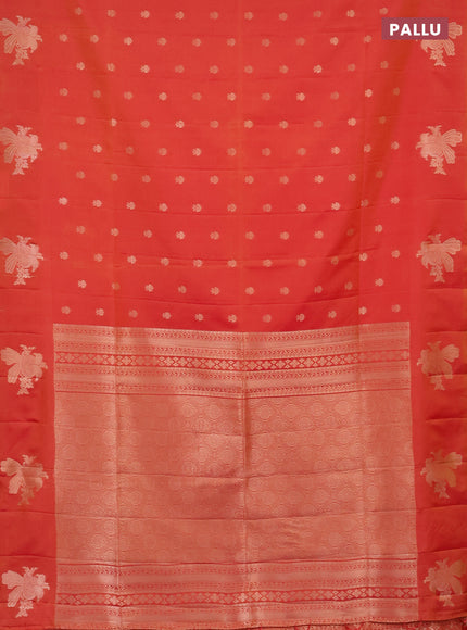 Semi soft silk saree dual shade of pinkisha orange with allover zari woven buttas with zari woven bird butta border