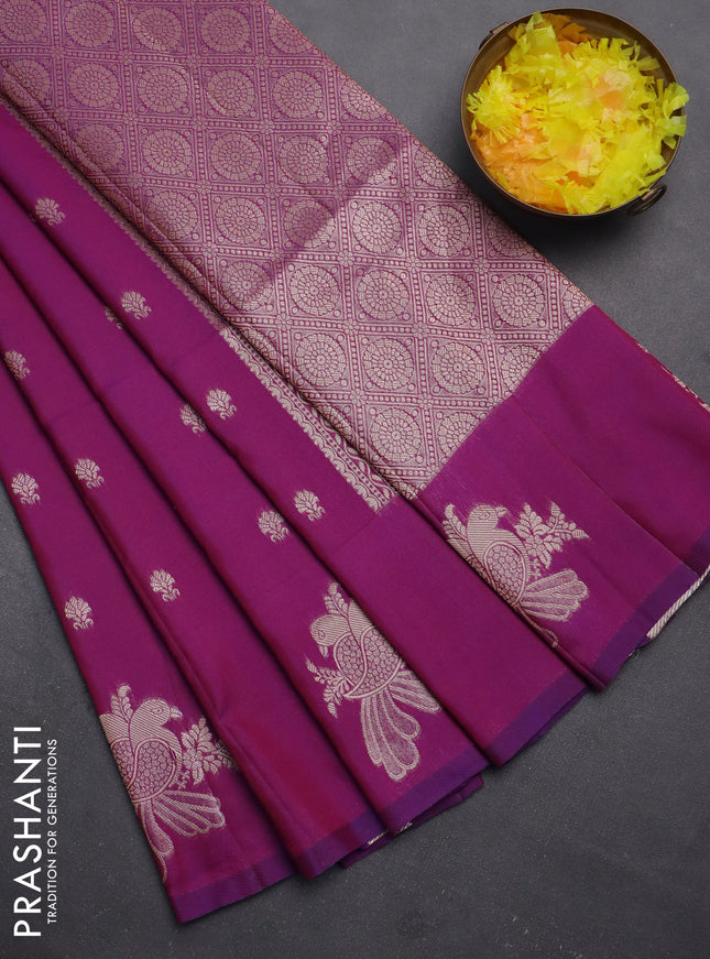 Semi soft silk saree dual shade of purple with allover zari woven buttas with zari woven bird butta border