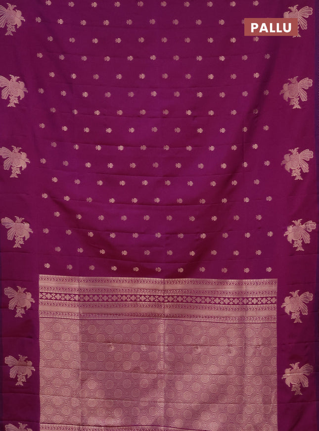 Semi soft silk saree dual shade of purple with allover zari woven buttas with zari woven bird butta border