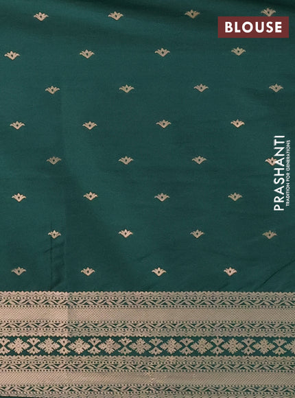 Semi soft silk saree dark green with allover zari woven buttas with zari woven bird butta border