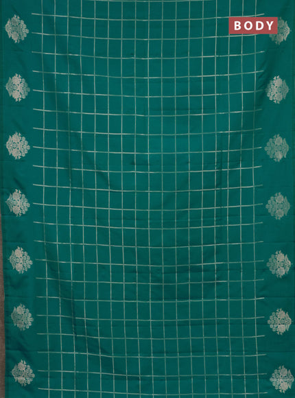 Semi soft silk saree teal green shade with allover zari woven checked pattern and zari woven floral butta border
