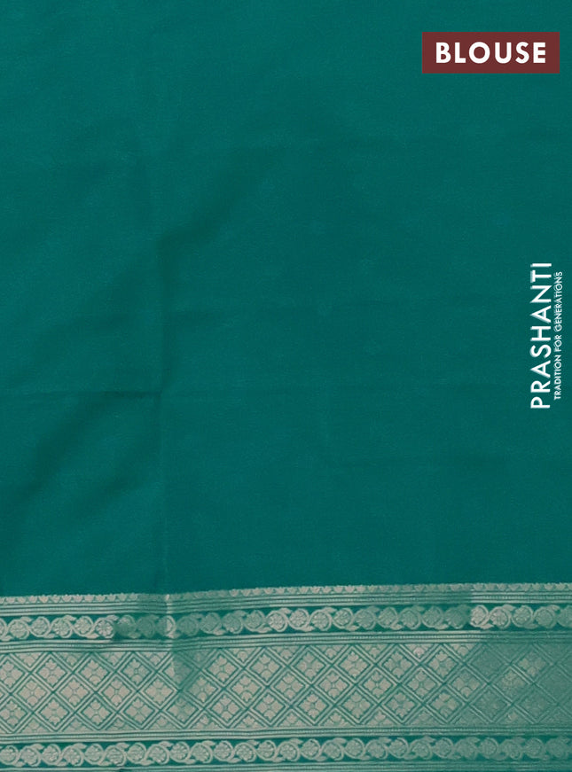 Semi soft silk saree teal green shade with allover zari woven checked pattern and zari woven floral butta border