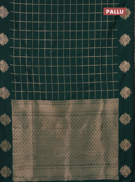 Semi soft silk saree green with allover zari woven checked pattern and zari woven floral butta border