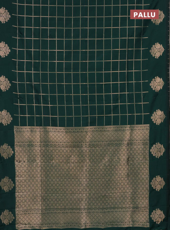 Semi soft silk saree green with allover zari woven checked pattern and zari woven floral butta border