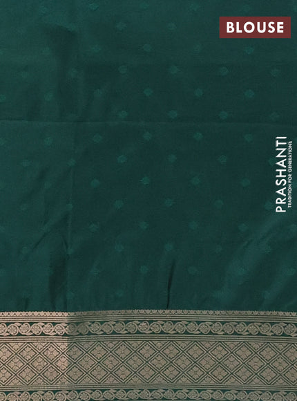 Semi soft silk saree green with allover zari woven checked pattern and zari woven floral butta border