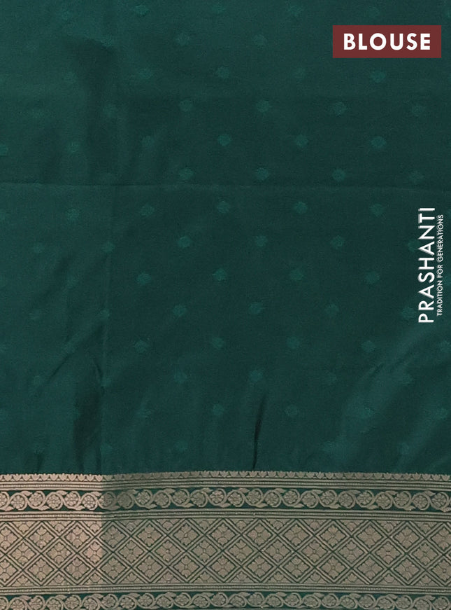 Semi soft silk saree green with allover zari woven checked pattern and zari woven floral butta border