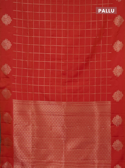 Semi soft silk saree dual shade of pinkisha orange with allover zari woven checked pattern and zari woven floral butta border