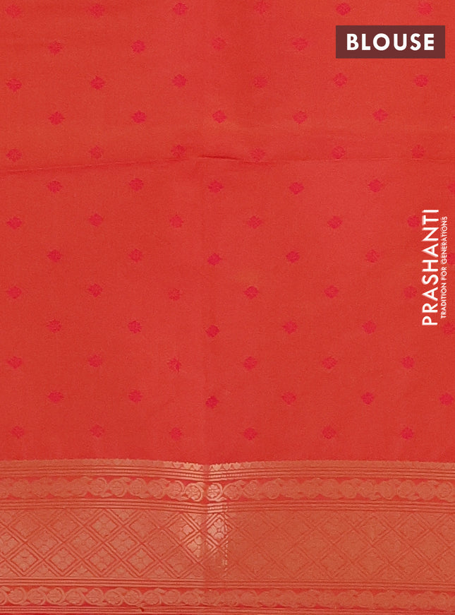 Semi soft silk saree dual shade of pinkisha orange with allover zari woven checked pattern and zari woven floral butta border