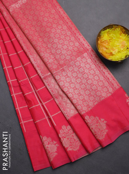 Semi soft silk saree pink with allover zari woven checked pattern and zari woven floral butta border