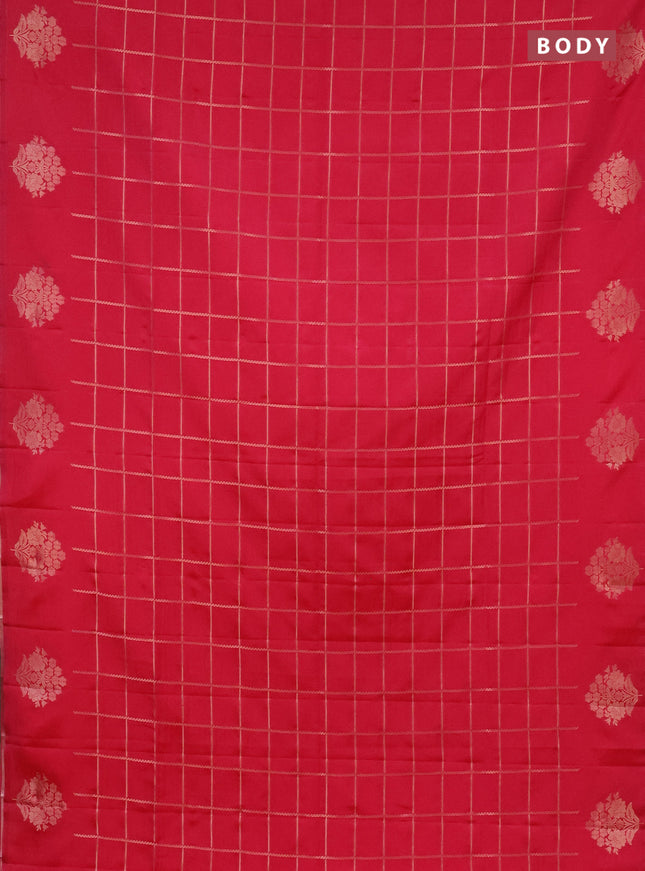 Semi soft silk saree pink with allover zari woven checked pattern and zari woven floral butta border