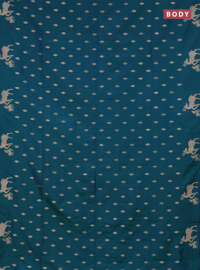 Semi soft silk saree dual shade of greenish blue with allover zari woven buttas and zari woven deer butta border