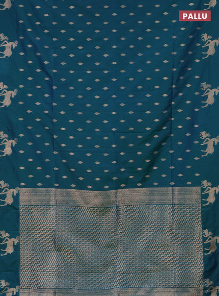 Semi soft silk saree dual shade of greenish blue with allover zari woven buttas and zari woven deer butta border