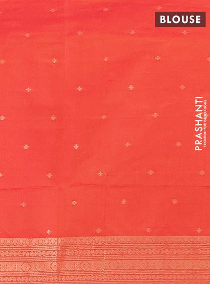 Semi soft silk saree dual shade of pinkish orange with allover zari woven buttas and zari woven deer butta border