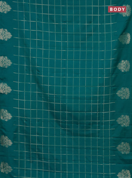Semi soft silk saree teal green shade with allover zari woven checked pattern with zari woven butta border