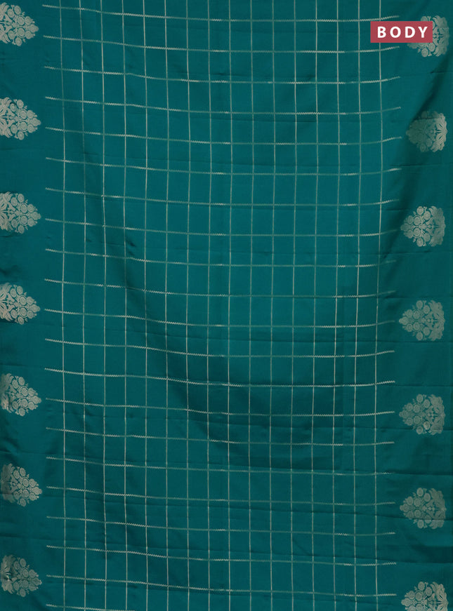 Semi soft silk saree teal green shade with allover zari woven checked pattern with zari woven butta border