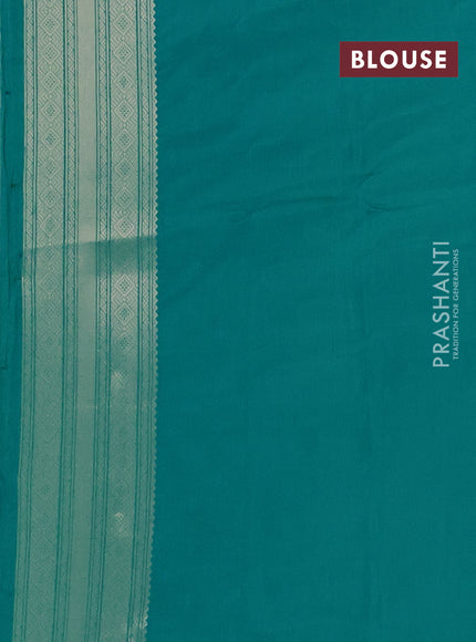 Semi soft silk saree teal green shade with allover zari woven checked pattern with zari woven butta border