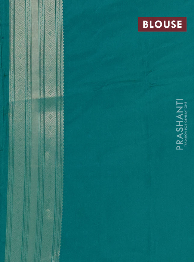Semi soft silk saree teal green shade with allover zari woven checked pattern with zari woven butta border